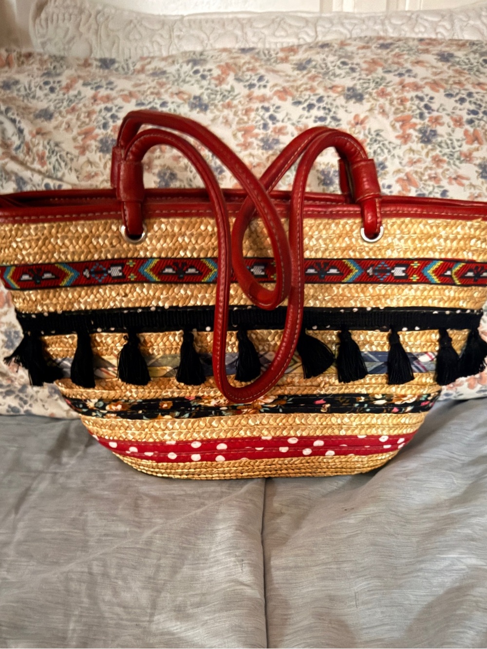 Woven Straw Tote with Red Leather Trim and Black Tassels